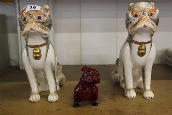 Group of Sutherland bone china figures of two models of Pug dogs & a Doulton flambe pug
